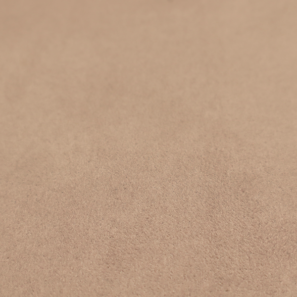 Annecy Water Repellent Velvet in Taupe. The fabric showcases a dense, plush pile with a soft matte finish in a classic, neutral brownish-grey tone. This high-performance upholstery material offers a luxurious texture combined with a specialized water-resistant coating for practical, everyday use.