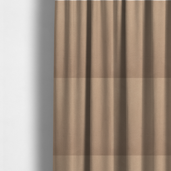 The fabric used to create these made-to-measure curtains showcases a dense, plush pile with a soft matte finish in a classic, neutral brownish-grey tone. This high-performance upholstery material offers a luxurious texture combined with a specialized water-resistant coating for practical, everyday use.