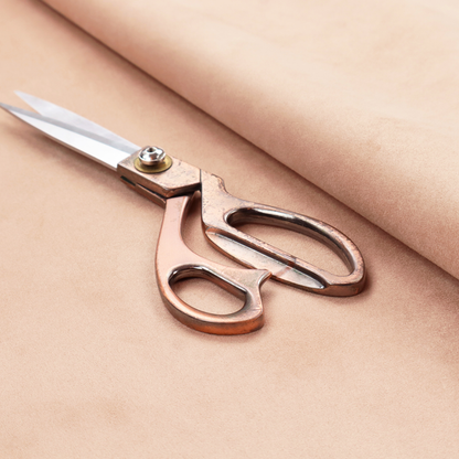 Annecy Water Repellent Velvet in Blush. The fabric features a dense, soft pile with a matte finish in a delicate, pale peachy-pink tone. This high-performance upholstery material offers a luxurious feel and a specialized water-resistant coating, making it both elegant and durable.