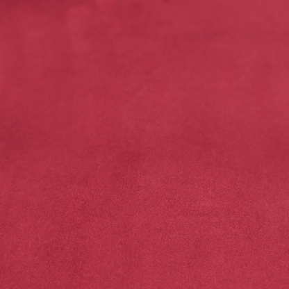 Annecy Water Repellent Velvet in Wine. The fabric features a dense, plush pile with a soft matte finish in a rich, vibrant crimson-red tone. This high-performance upholstery material offers a luxurious feel and a specialized water-resistant coating for superior durability and style.
