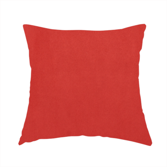 The fabric used to create this handmade cushion features a dense, plush pile with a soft matte finish in a bold, classic primary red. This high-performance upholstery material offers a luxurious feel and a specialized water-resistant coating for superior durability and a vibrant look.