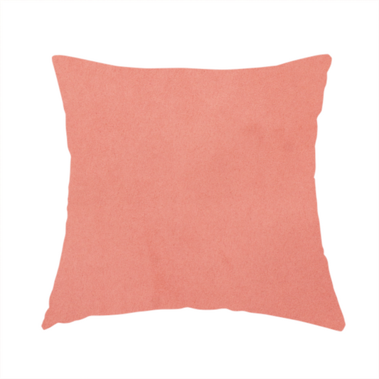 The fabric used to create this handmade cushion features a dense, plush pile with a soft matte finish in a warm, vibrant pinkish-orange tone. This high-performance upholstery material offers a luxurious feel combined with a specialized water-resistant coating for enhanced durability and a fresh, modern look.