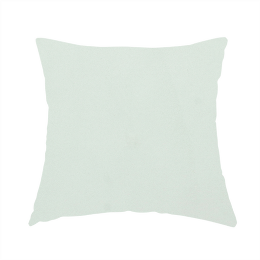 The fabric used to create this handmade cushion features a dense, plush pile with a soft matte finish in a very pale, cool-toned minty blue. This high-performance upholstery material offers a luxurious feel and a specialized water-resistant coating for superior durability and a serene, modern aesthetic.