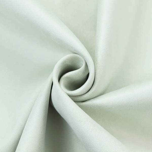 Annecy Water Repellent Velvet in Duck Egg. The fabric features a dense, plush pile with a soft matte finish in a very pale, cool-toned minty blue. This high-performance upholstery material offers a luxurious feel and a specialized water-resistant coating for superior durability and a serene, modern aesthetic.