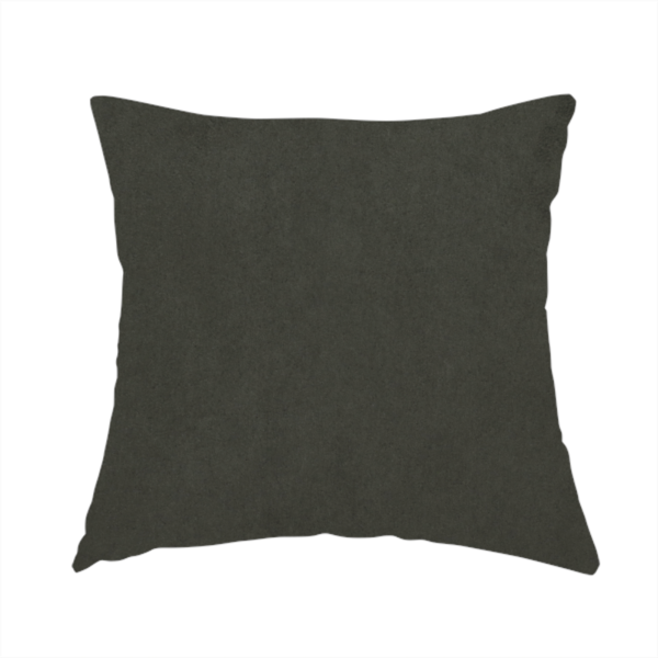 The fabric used to create these handmade cushions features a dense, plush pile with a soft matte finish in a deep, rich evergreen shade. This high-performance upholstery material offers a luxurious feel and a specialized water-resistant coating for superior durability and a classic, sophisticated look.