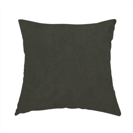 The fabric used to create these handmade cushions features a dense, plush pile with a soft matte finish in a deep, rich evergreen shade. This high-performance upholstery material offers a luxurious feel and a specialized water-resistant coating for superior durability and a classic, sophisticated look.