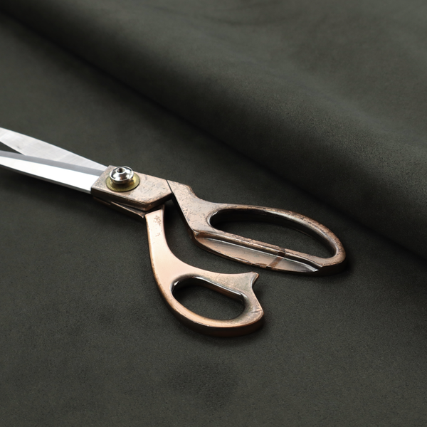 Annecy Water Repellent Velvet in Forest Green. The fabric features a dense, plush pile with a soft matte finish in a deep, rich evergreen shade. This high-performance upholstery material offers a luxurious feel and a specialized water-resistant coating for superior durability and a classic, sophisticated look.