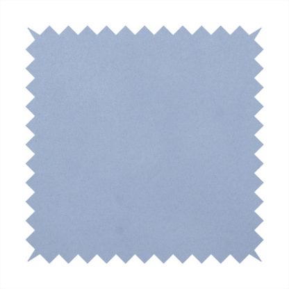 Annecy Water Repellent Velvet in Sky Blue. The fabric showcases a dense, uniform pile in a soft, serene powder blue. This high-performance upholstery material combines a luxurious matte aesthetic with a water-resistant finish, perfect for durable yet stylish furniture.