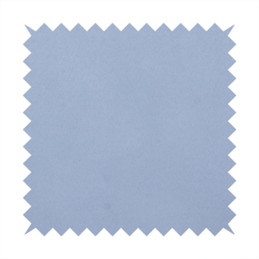 Annecy Water Repellent Velvet in Sky Blue. The fabric showcases a dense, uniform pile in a soft, serene powder blue. This high-performance upholstery material combines a luxurious matte aesthetic with a water-resistant finish, perfect for durable yet stylish furniture.