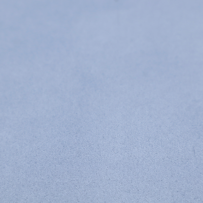 Annecy Water Repellent Velvet in Sky Blue. The fabric showcases a dense, uniform pile in a soft, serene powder blue. This high-performance upholstery material combines a luxurious matte aesthetic with a water-resistant finish, perfect for durable yet stylish furniture.