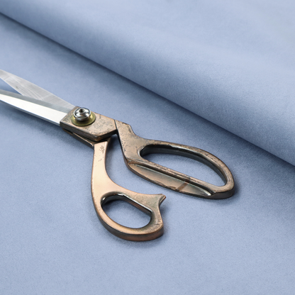 Annecy Water Repellent Velvet in Sky Blue. The fabric showcases a dense, uniform pile in a soft, serene powder blue. This high-performance upholstery material combines a luxurious matte aesthetic with a water-resistant finish, perfect for durable yet stylish furniture.