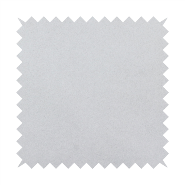 Annecy Water Repellent Velvet in Silver. The fabric features a dense, plush pile with a soft matte finish in a bright, clean light grey. This high-performance upholstery material offers a luxurious texture and a specialized water-resistant coating for a modern, durable aesthetic.