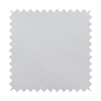 Annecy Water Repellent Velvet in Silver. The fabric features a dense, plush pile with a soft matte finish in a bright, clean light grey. This high-performance upholstery material offers a luxurious texture and a specialized water-resistant coating for a modern, durable aesthetic.