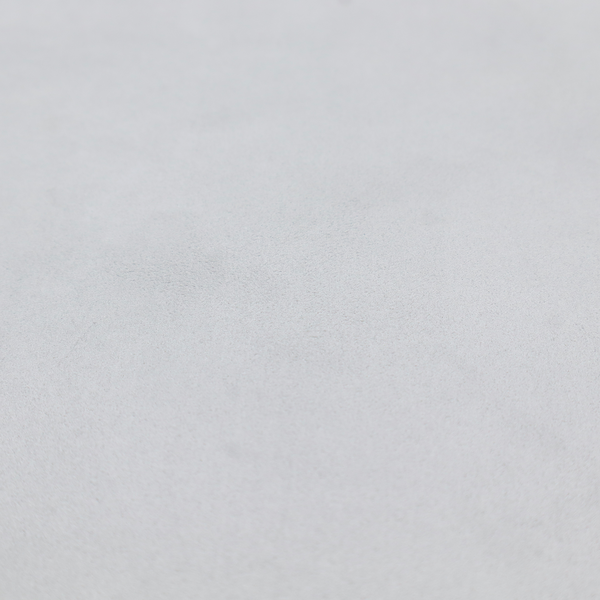 Annecy Water Repellent Velvet in Silver. The fabric features a dense, plush pile with a soft matte finish in a bright, clean light grey. This high-performance upholstery material offers a luxurious texture and a specialized water-resistant coating for a modern, durable aesthetic.