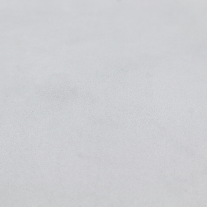 Annecy Water Repellent Velvet in Silver. The fabric features a dense, plush pile with a soft matte finish in a bright, clean light grey. This high-performance upholstery material offers a luxurious texture and a specialized water-resistant coating for a modern, durable aesthetic.