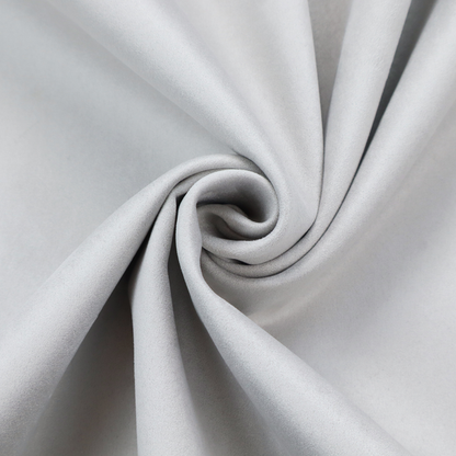 Annecy Water Repellent Velvet in Silver. The fabric features a dense, plush pile with a soft matte finish in a bright, clean light grey. This high-performance upholstery material offers a luxurious texture and a specialized water-resistant coating for a modern, durable aesthetic.