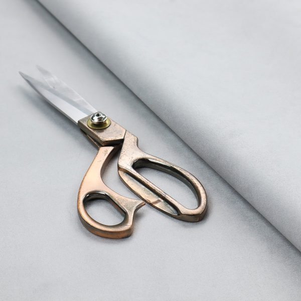 Annecy Water Repellent Velvet in Silver. The fabric features a dense, plush pile with a soft matte finish in a bright, clean light grey. This high-performance upholstery material offers a luxurious texture and a specialized water-resistant coating for a modern, durable aesthetic.