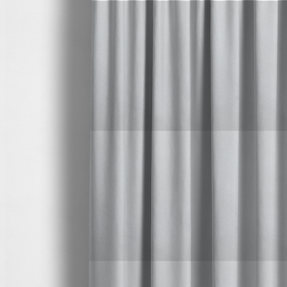 The fabric used to create these made-to-measure curtains features a dense, plush pile with a soft matte finish in a bright, clean light grey. This high-performance upholstery material offers a luxurious texture and a specialized water-resistant coating for a modern, durable aesthetic.