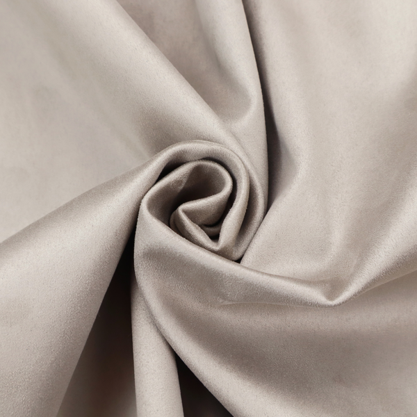 Annecy Water Repellent Velvet in Dove Grey. The fabric features a dense, plush pile with a soft matte finish in a sophisticated, pale neutral grey. This high-performance upholstery material offers a luxurious feel and a specialized water-resistant coating for superior durability and a timeless, elegant look.
