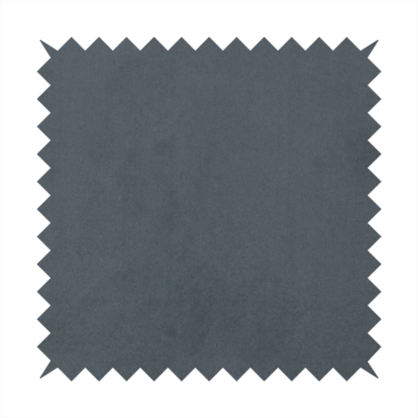 Annecy Water Repellent Velvet in Seal Grey. The fabric features a dense, plush pile with a soft matte finish in a sophisticated mid-to-dark neutral grey. This high-performance upholstery material offers a luxurious feel and a specialized water-resistant coating for superior durability and a sleek, modern aesthetic.