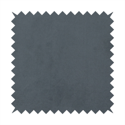 Annecy Water Repellent Velvet in Seal Grey. The fabric features a dense, plush pile with a soft matte finish in a sophisticated mid-to-dark neutral grey. This high-performance upholstery material offers a luxurious feel and a specialized water-resistant coating for superior durability and a sleek, modern aesthetic.
