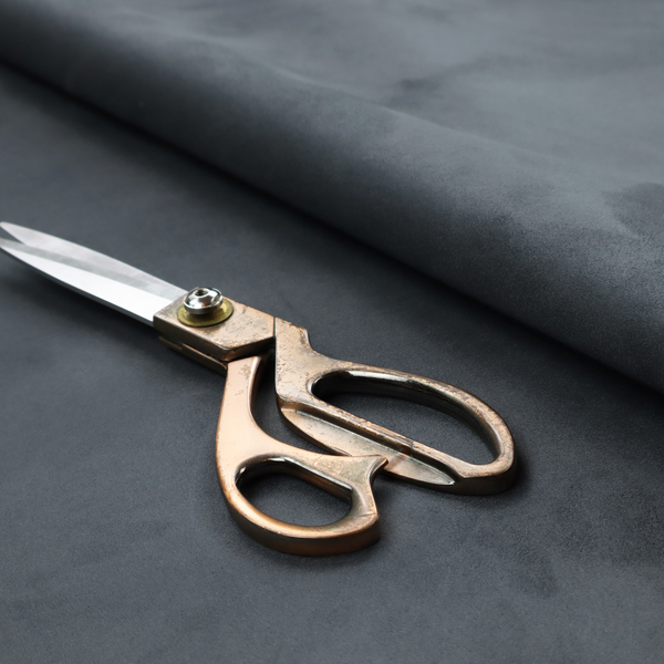 Annecy Water Repellent Velvet in Seal Grey. The fabric features a dense, plush pile with a soft matte finish in a sophisticated mid-to-dark neutral grey. This high-performance upholstery material offers a luxurious feel and a specialized water-resistant coating for superior durability and a sleek, modern aesthetic.