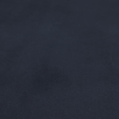 Annecy Water Repellent Velvet in Navy. The fabric showcases a dense, uniform pile with a soft matte finish in a deep, midnight blue. This high-performance upholstery material combines a luxurious texture with a specialized water-resistant coating for a sophisticated and durable finish.