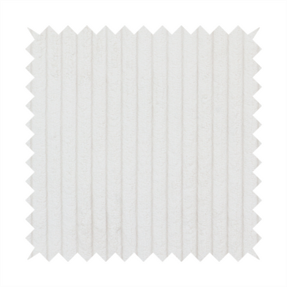 This fabric is a white corduroy with a consistent vertical ribbed texture.