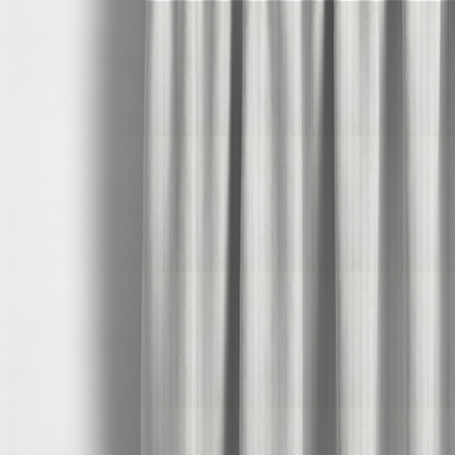 The fabric used to create these made-to-measure curtains is a white corduroy with a consistent vertical ribbed texture.