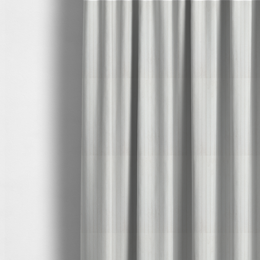 The fabric used to create these made-to-measure curtains is a white corduroy with a consistent vertical ribbed texture.