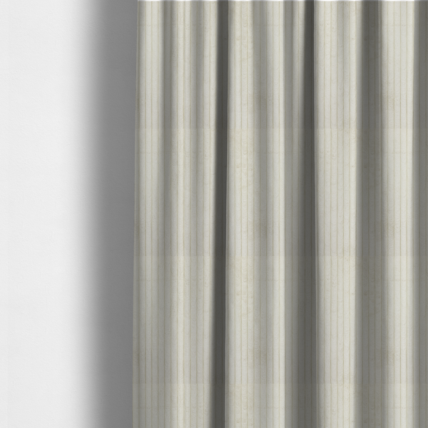 The fabric used to create these made-to-measure curtains is a off-white or cream-coloured corduroy featuring a consistent, vertical ribbed texture.