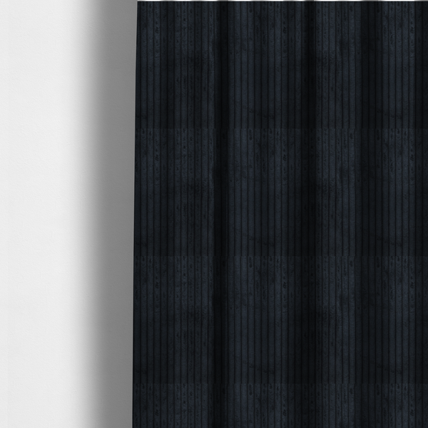 the fabric used to create these made-to-measure curtains is a dark charcoal or black corduroy with a consistent vertical ribbed texture.