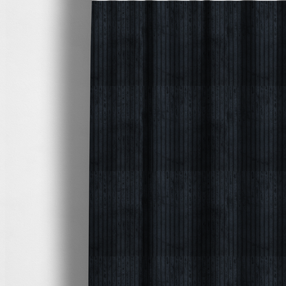 the fabric used to create these made-to-measure curtains is a dark charcoal or black corduroy with a consistent vertical ribbed texture.