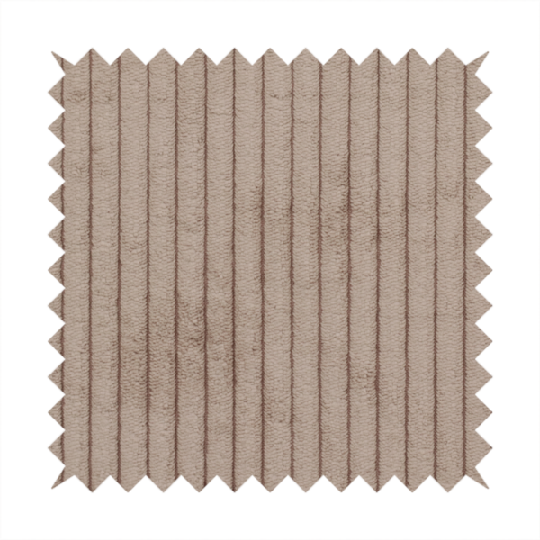 This fabric is a beige or light taupe corduroy featuring a consistent vertical ribbed texture.
