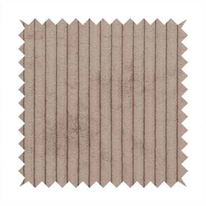 This fabric is a beige or light taupe corduroy featuring a consistent vertical ribbed texture.