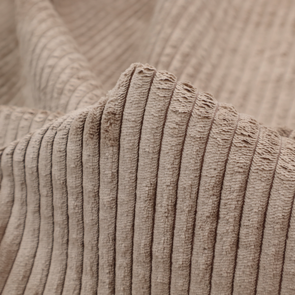 This fabric is a beige or light taupe corduroy featuring a consistent vertical ribbed texture.