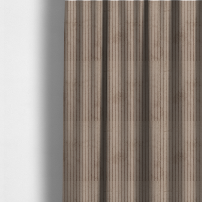 The fabric used to create these made-to-measure curtains is a beige or light taupe corduroy featuring a consistent vertical ribbed texture.