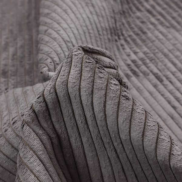 This fabric is a cool brown corduroy featuring a consistent vertical ribbed texture.
