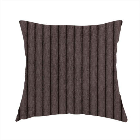 The fabric used to create this handmade cushion is a dark chocolate brown corduroy featuring a consistent vertical ribbed texture.