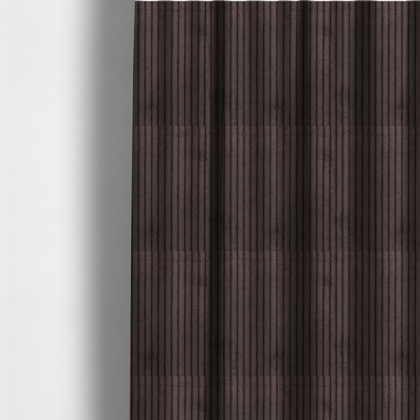 The fabric used to create these made-to-measure curtains is a dark chocolate brown corduroy featuring a consistent vertical ribbed texture.