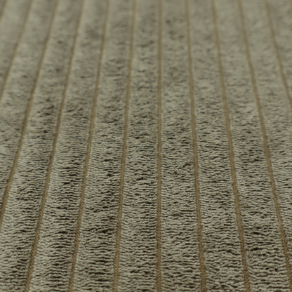 This fabric is an olive-green corduroy featuring a consistent vertical ribbed texture.