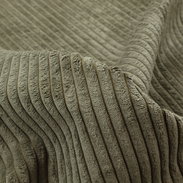 This fabric is an olive-green corduroy featuring a consistent vertical ribbed texture.