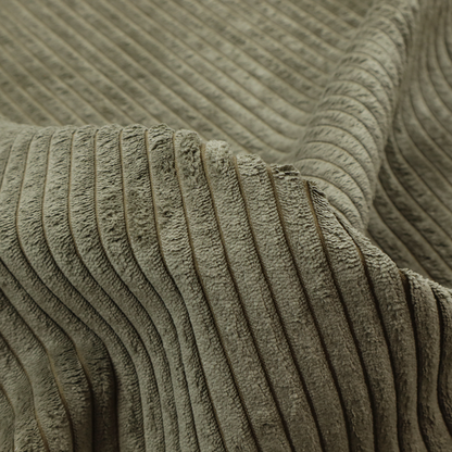 This fabric is an olive-green corduroy featuring a consistent vertical ribbed texture.