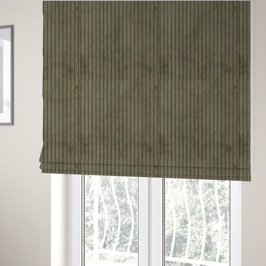 The fabric used to create these Roman blinds is an olive-green corduroy featuring a consistent vertical ribbed texture.