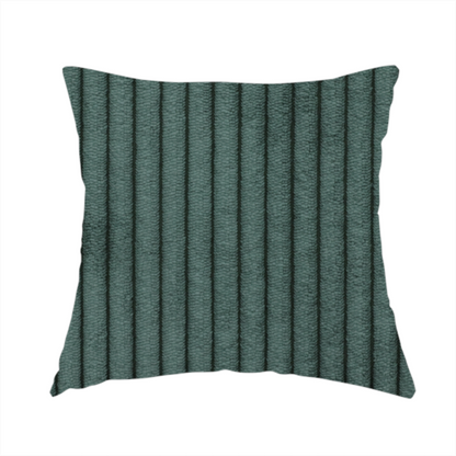 The fabric used to create these handmade cushions is a teal-green corduroy featuring a consistent vertical ribbed texture.