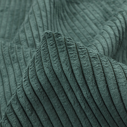 This fabric is a teal-green corduroy featuring a consistent vertical ribbed texture.