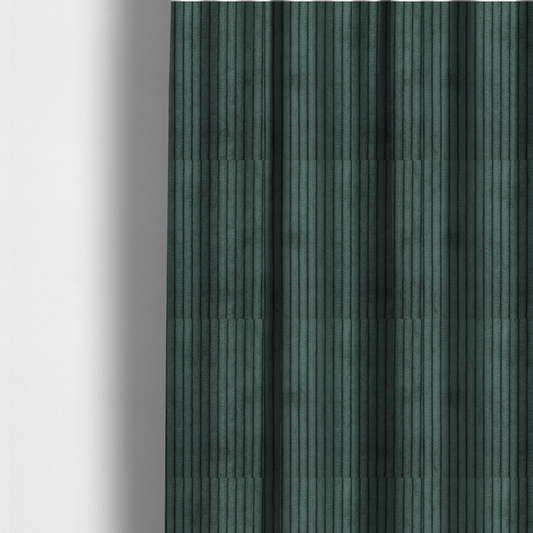 The fabric used to create these made-to-measure curtains is a teal-green corduroy featuring a consistent vertical ribbed texture.
