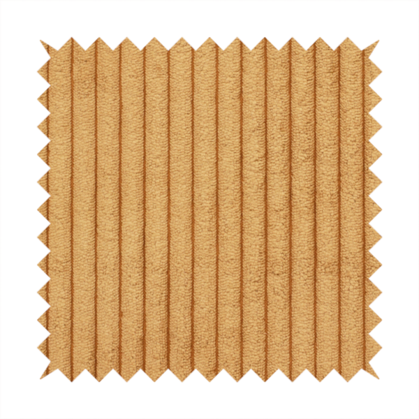 This fabric is a warm, golden-yellow or ochre corduroy featuring a consistent vertical ribbed texture.