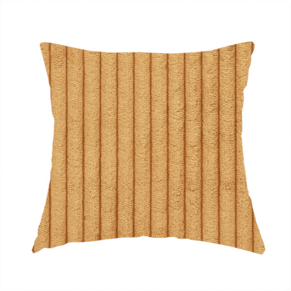 The fabric used to create these handmade cushions  is a warm, golden-yellow or ochre corduroy featuring a consistent vertical ribbed texture.