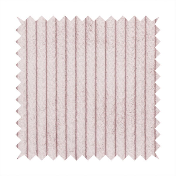 This fabric is a soft, dusty pink or blush-coloured corduroy featuring a consistent vertical ribbed texture.
